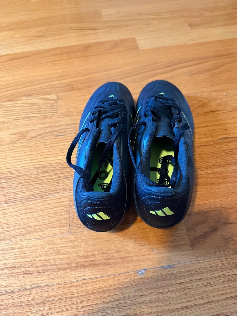 Adidas’s Men's black Soccer cleats with Neon Yellow Highlights size 7.5
